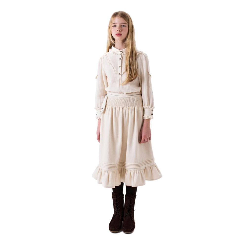 Bela suknja od punijeg organskog pamuka idealna za jesen i zimu
